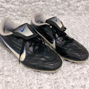 Nike Black and White Youth Soccer Cleats with Blue Accents